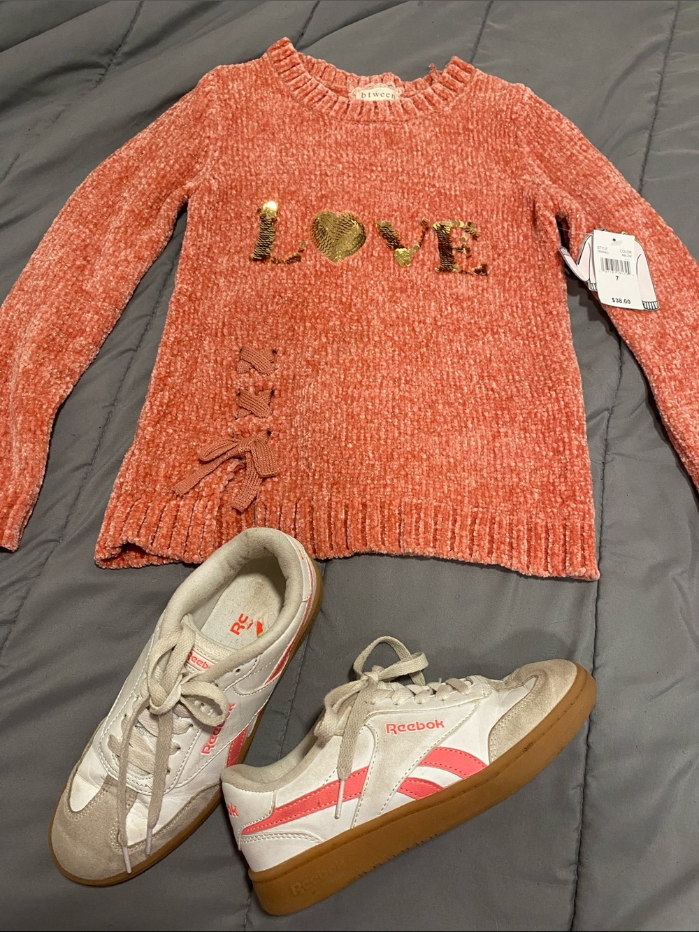 btween Coral Pink Chenille 'LOVE' Sweater with Gold Sequins and Reebok sneakers